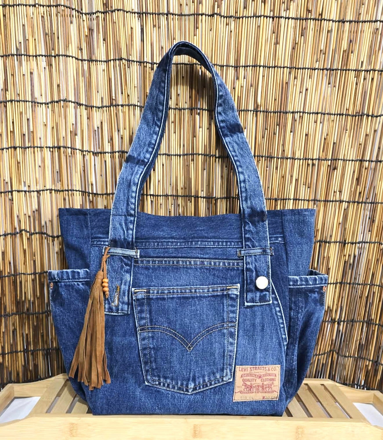 Upcycled Levi's denim tote bag with leather tassel. Sustainable denim tote bag, handmade blue jean handbag, upcycled patchwork shopper, unique boho purse